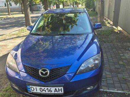 Синий Мазда 3, объемом двигателя 1.6 л и пробегом 214 тыс. км за 5500 $, фото 1 на Automoto.ua