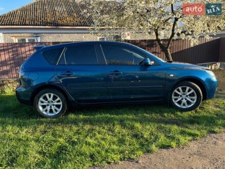Синий Мазда 3, объемом двигателя 1.6 л и пробегом 242 тыс. км за 4200 $, фото 1 на Automoto.ua