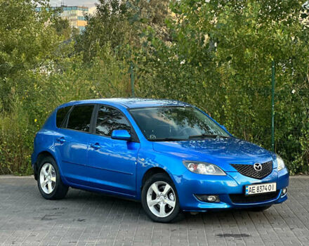 Синий Мазда 3, объемом двигателя 1.6 л и пробегом 265 тыс. км за 5950 $, фото 1 на Automoto.ua