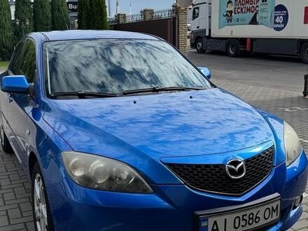 Синий Мазда 3, объемом двигателя 1.6 л и пробегом 234 тыс. км за 3500 $, фото 1 на Automoto.ua