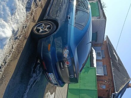 Синий Мазда 3, объемом двигателя 2 л и пробегом 123 тыс. км за 3650 $, фото 1 на Automoto.ua