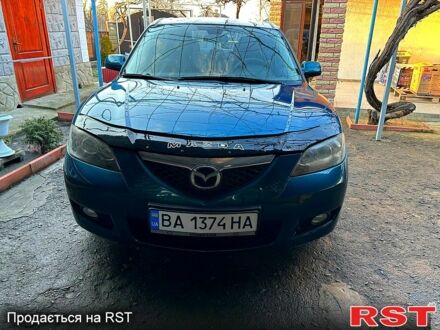 Синий Мазда 3, объемом двигателя 2 л и пробегом 247 тыс. км за 4300 $, фото 1 на Automoto.ua