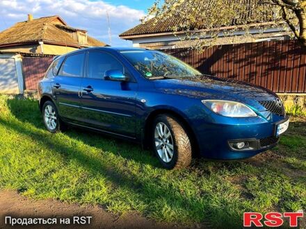Синий Мазда 3, объемом двигателя 1.6 л и пробегом 242 тыс. км за 4700 $, фото 1 на Automoto.ua