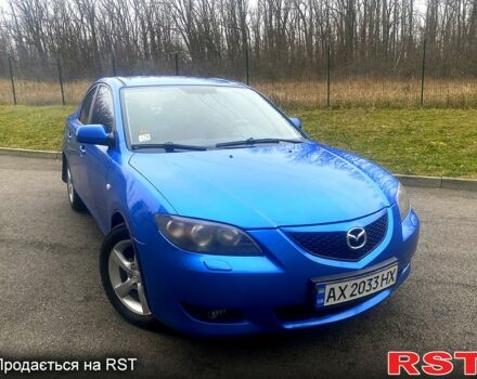 Синий Мазда 3, объемом двигателя 1.6 л и пробегом 255 тыс. км за 5200 $, фото 1 на Automoto.ua