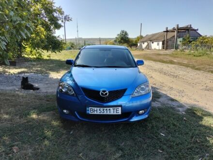 Синий Мазда 3, объемом двигателя 1.6 л и пробегом 200 тыс. км за 5500 $, фото 1 на Automoto.ua