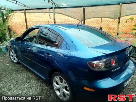 Синий Мазда 3, объемом двигателя 2 л и пробегом 258 тыс. км за 4500 $, фото 1 на Automoto.ua