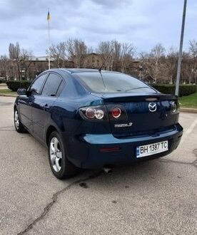 Синий Мазда 3, объемом двигателя 1.6 л и пробегом 170 тыс. км за 5450 $, фото 1 на Automoto.ua