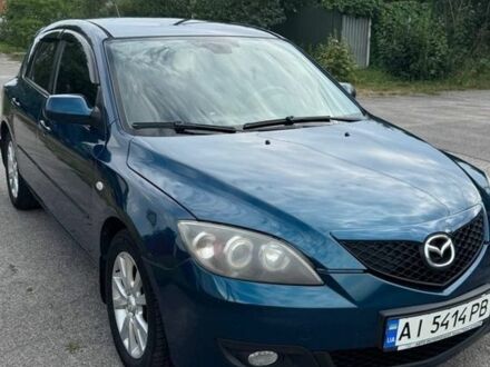 Синий Мазда 3, объемом двигателя 1.6 л и пробегом 291 тыс. км за 5200 $, фото 1 на Automoto.ua