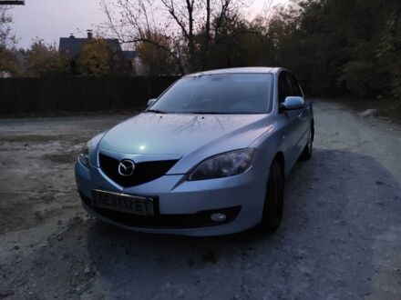 Синий Мазда 3, объемом двигателя 1.6 л и пробегом 185 тыс. км за 7000 $, фото 1 на Automoto.ua