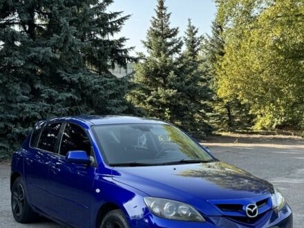 Синий Мазда 3, объемом двигателя 1.6 л и пробегом 250 тыс. км за 4400 $, фото 1 на Automoto.ua