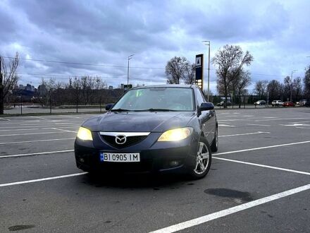 Синий Мазда 3, объемом двигателя 2 л и пробегом 239 тыс. км за 6200 $, фото 1 на Automoto.ua