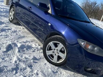 Синій Мазда 3, об'ємом двигуна 2 л та пробігом 240 тис. км за 5499 $, фото 1 на Automoto.ua