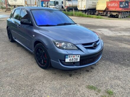 Синий Мазда 3, объемом двигателя 2.3 л и пробегом 240 тыс. км за 6800 $, фото 1 на Automoto.ua