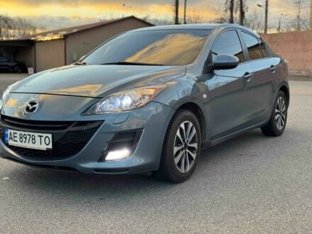 Синий Мазда 3, объемом двигателя 1.6 л и пробегом 170 тыс. км за 7500 $, фото 1 на Automoto.ua