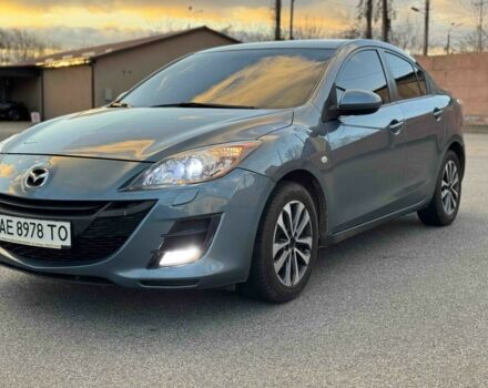 Синий Мазда 3, объемом двигателя 1.6 л и пробегом 170 тыс. км за 7500 $, фото 1 на Automoto.ua