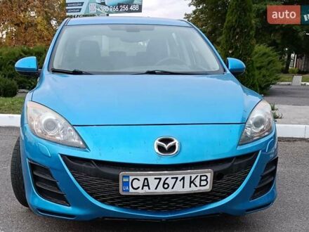 Синий Мазда 3, объемом двигателя 1.6 л и пробегом 235 тыс. км за 6650 $, фото 1 на Automoto.ua