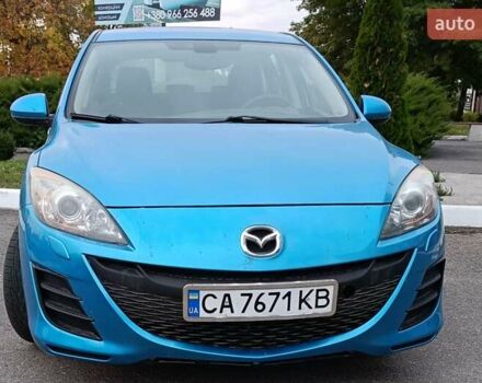 Синий Мазда 3, объемом двигателя 1.6 л и пробегом 235 тыс. км за 6650 $, фото 1 на Automoto.ua