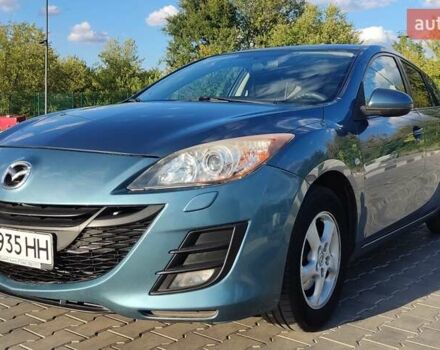 Синий Мазда 3, объемом двигателя 1.6 л и пробегом 150 тыс. км за 7500 $, фото 1 на Automoto.ua