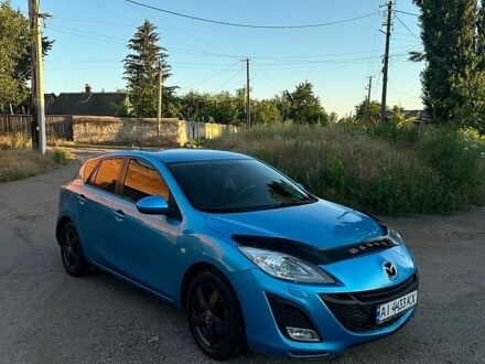 Синий Мазда 3, объемом двигателя 2.2 л и пробегом 190 тыс. км за 6000 $, фото 1 на Automoto.ua