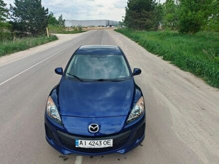 Синий Мазда 3, объемом двигателя 2 л и пробегом 238 тыс. км за 6999 $, фото 1 на Automoto.ua