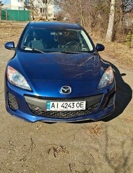 Синий Мазда 3, объемом двигателя 2 л и пробегом 238 тыс. км за 7400 $, фото 1 на Automoto.ua