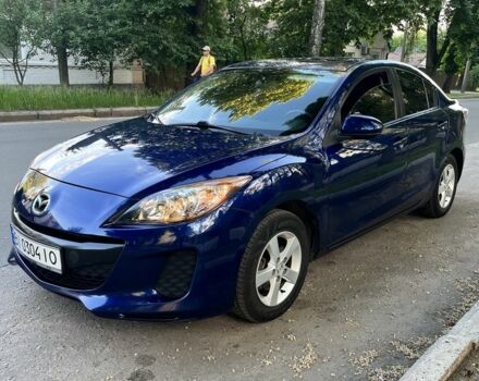 Синий Мазда 3, объемом двигателя 2 л и пробегом 197 тыс. км за 7000 $, фото 1 на Automoto.ua