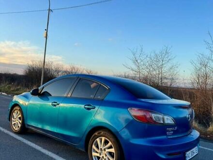 Синий Мазда 3, объемом двигателя 2 л и пробегом 256 тыс. км за 7000 $, фото 1 на Automoto.ua