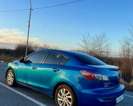 Синий Мазда 3, объемом двигателя 2 л и пробегом 256 тыс. км за 7000 $, фото 1 на Automoto.ua