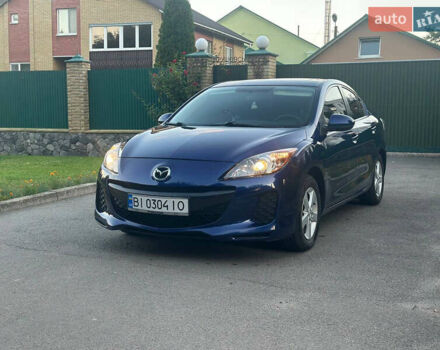 Синий Мазда 3, объемом двигателя 2 л и пробегом 180 тыс. км за 7300 $, фото 1 на Automoto.ua
