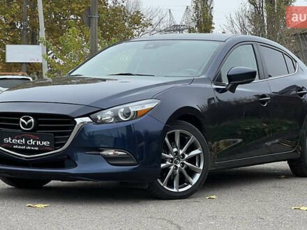 Синий Мазда 3, объемом двигателя 2.49 л и пробегом 65 тыс. км за 14599 $, фото 1 на Automoto.ua
