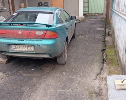 Зеленый Мазда 3, объемом двигателя 1.5 л и пробегом 250 тыс. км за 2000 $, фото 3 на Automoto.ua