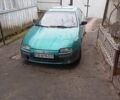 Зеленый Мазда 3, объемом двигателя 1.5 л и пробегом 250 тыс. км за 2000 $, фото 1 на Automoto.ua