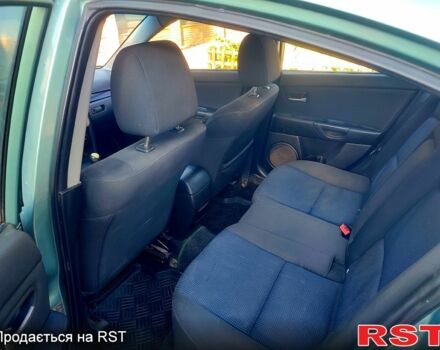 Зеленый Мазда 3, объемом двигателя 1.6 л и пробегом 300 тыс. км за 3900 $, фото 7 на Automoto.ua