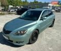 Зеленый Мазда 3, объемом двигателя 2 л и пробегом 200 тыс. км за 1950 $, фото 1 на Automoto.ua