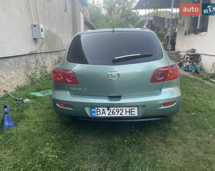 Зелений Мазда 3, об'ємом двигуна 1.6 л та пробігом 337 тис. км за 3100 $, фото 3 на Automoto.ua