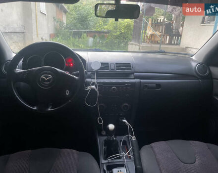 Зелений Мазда 3, об'ємом двигуна 1.6 л та пробігом 337 тис. км за 3100 $, фото 6 на Automoto.ua