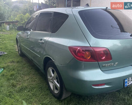 Зелений Мазда 3, об'ємом двигуна 1.6 л та пробігом 337 тис. км за 3100 $, фото 4 на Automoto.ua
