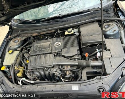 Зеленый Мазда 3, объемом двигателя 1.6 л и пробегом 140 тыс. км за 4600 $, фото 12 на Automoto.ua