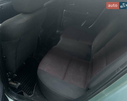 Зелений Мазда 3, об'ємом двигуна 1.6 л та пробігом 337 тис. км за 3100 $, фото 8 на Automoto.ua
