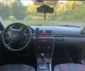 Зеленый Мазда 3, объемом двигателя 1.6 л и пробегом 301 тыс. км за 5200 $, фото 7 на Automoto.ua