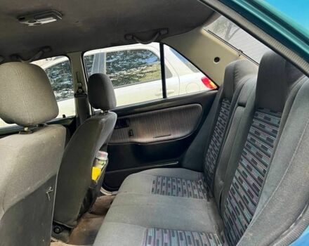 Зеленый Мазда 3, объемом двигателя 1 л и пробегом 420 тыс. км за 797 $, фото 2 на Automoto.ua