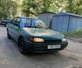 Зеленый Мазда 3, объемом двигателя 1 л и пробегом 420 тыс. км за 797 $, фото 1 на Automoto.ua