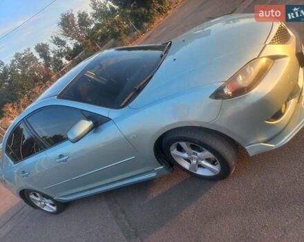 Зеленый Мазда 3, объемом двигателя 2 л и пробегом 177 тыс. км за 5600 $, фото 6 на Automoto.ua