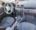 Зелений Мазда 3, об'ємом двигуна 1.6 л та пробігом 300 тис. км за 3900 $, фото 14 на Automoto.ua