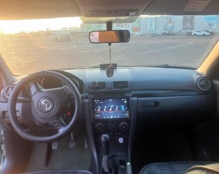 Зеленый Мазда 3, объемом двигателя 2 л и пробегом 177 тыс. км за 5600 $, фото 5 на Automoto.ua