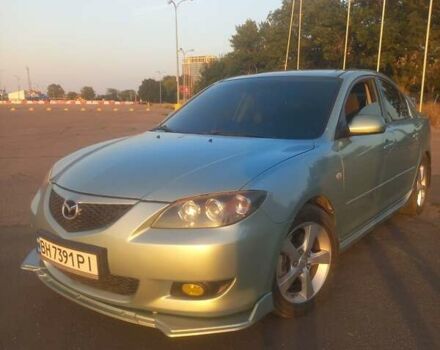 Зеленый Мазда 3, объемом двигателя 2 л и пробегом 177 тыс. км за 5600 $, фото 7 на Automoto.ua