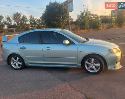 Зеленый Мазда 3, объемом двигателя 2 л и пробегом 177 тыс. км за 5600 $, фото 2 на Automoto.ua