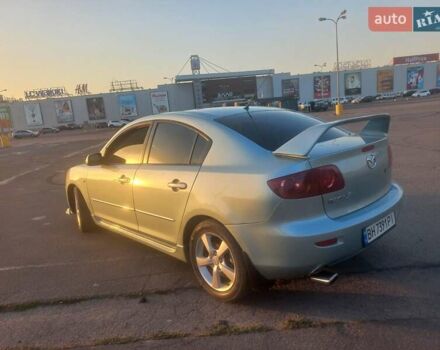 Зеленый Мазда 3, объемом двигателя 2 л и пробегом 177 тыс. км за 5600 $, фото 3 на Automoto.ua