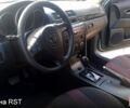 Зеленый Мазда 3, объемом двигателя 1.6 л и пробегом 210 тыс. км за 4999 $, фото 2 на Automoto.ua