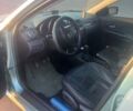 Зеленый Мазда 3, объемом двигателя 2 л и пробегом 177 тыс. км за 5600 $, фото 4 на Automoto.ua